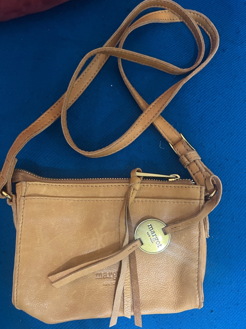margot Tan Leather Crossbody with Tassel and Medallion